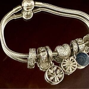 Pandora Silver Charm Bracelet with Intricate Details